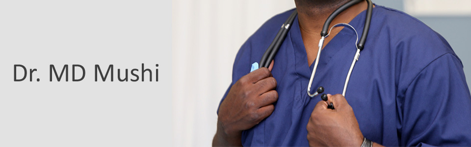 DR MD MUSHI close-up of a doctor holding a stethoscope